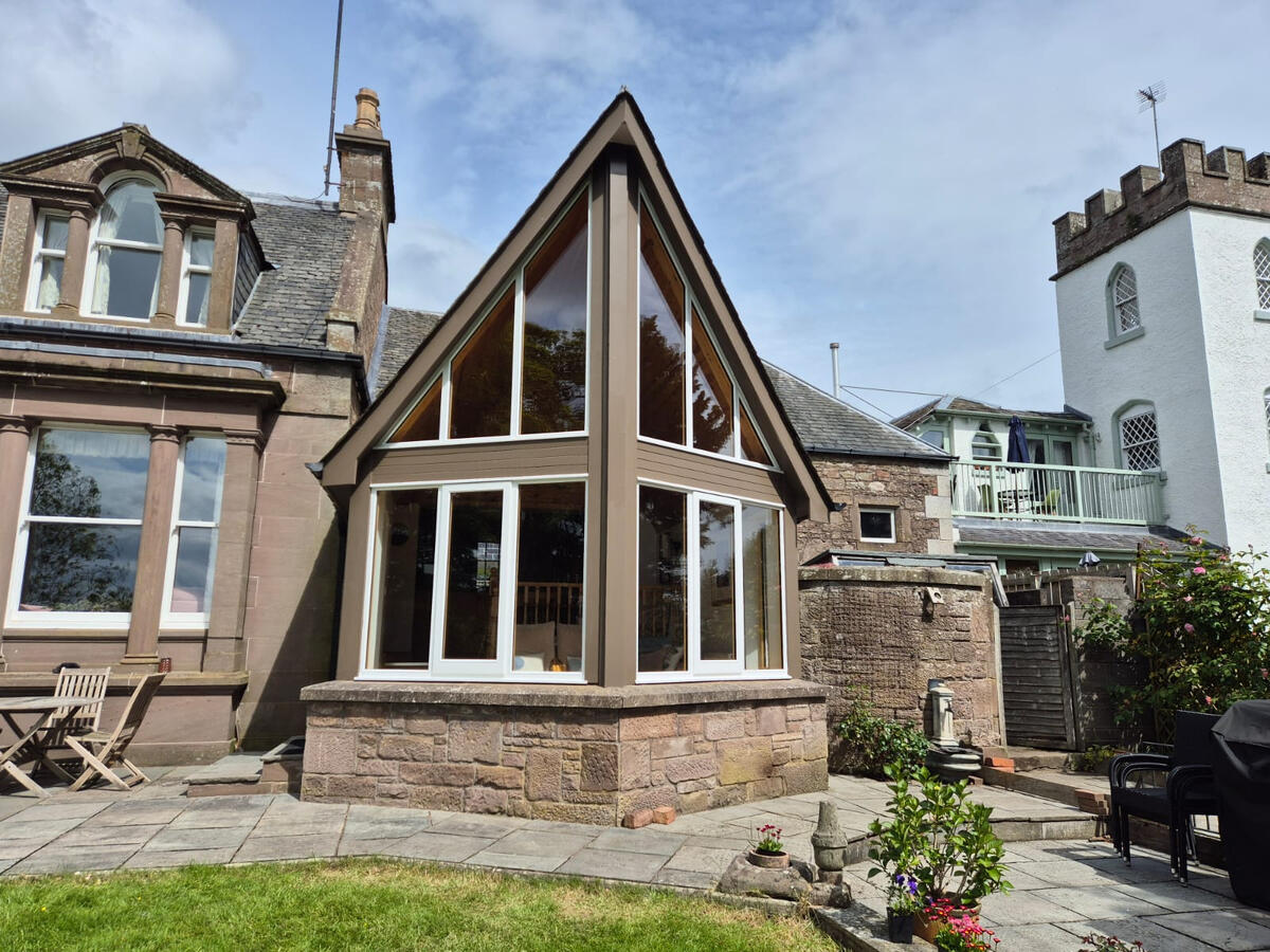 "Blair Joinery Ltd joinery services in Clydebank" "Newly installed timber windows by Blair Joinery Ltd" "Blair Joinery Ltd craftsmanship in wooden furniture"